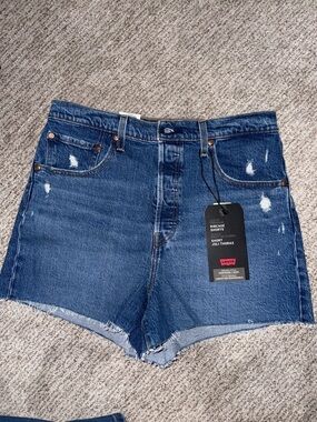 Levi's Distressed Dark Blue Denim Cutoff Shorts